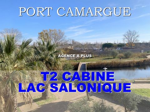 PORT CAMARGUE - SECTEUR LAC SALONIQUE EN EXCLUSIVITÉ Dans une résidence au bord du lac avec piscine et ascenseur située à 1km de la plage nord et à 400 m de port de plaisance. Appartement de type 2 pièces cabine au 2e étage. Une terrasse de 7 m2 expo...