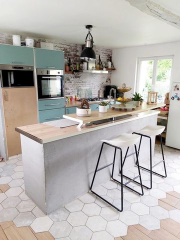Maison style longère avec garage et jardin