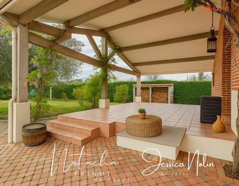 À Villaudric, maison de caractère avec jardin de 3000 m² et double garage