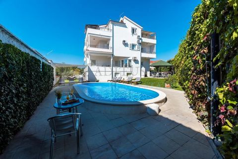 Luxury house with pool for sale - fantastic location in Vodice!   The house consists of 11 apartments spread over three floors - ground floor, first and second floor. Each floor has a total of 145 square meters of net usable area.   On the ground flo...