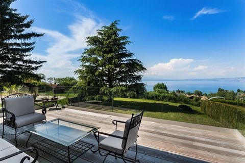 EVIAN, Exceptional and rare and authentic Farm building of about 300 m2, located on a plot of 2317 m2 with a beautiful view over the blue waters of Lake Leman and not overlooked, combining the perfect marriage between stone, wood and beautiful expose...