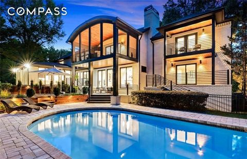Stunning 5BR modern masterpiece in the heart of Sandy Springs (inside 285) perched atop a quiet cul-de-sac in the exclusive Powers Place community on almost an acre of private fenced land. Luxury is in the detail with too many bells & whistles to lis...