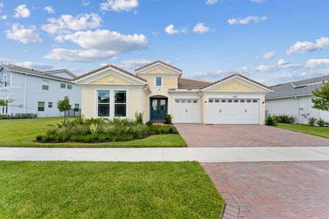 Welcome to this stunning lakefront home in the serene and sought-after community of the Orchards of Westlake, FL. This beautiful 2,951 sq ft residence offers the perfect blend of luxury, comfort, and nature. With nearly 3,000 sq ft of living space, t...