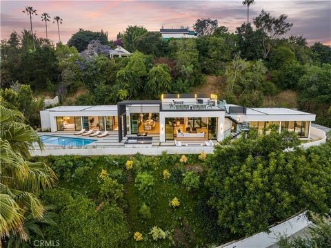 Welcome to a sanctuary of ultimate privacy and sophisticated modern architecture, nestled in the coveted celebrity enclave of Bel Air. This single-story estate epitomizes luxury living, offering a blend of unparalleled privacy and ease of access to B...