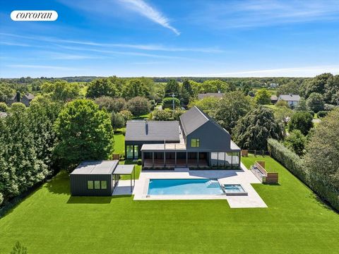 72 Strongs Lane is a modern masterpiece in the heart of Water Mill. Innovative design, incredible details, and unparalleled craftsmanship are merged to craft a new estate spanning just over 8800SF on just under an acre. Expansive glass walls paired w...