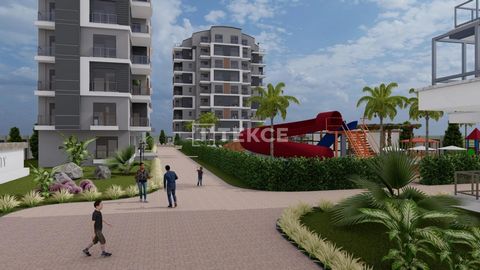 Chique Design Woningen in een Uitgebreid Complex met Zwembad in Antalya Aksu De woningen zijn gelegen in Altıntaş, een groeiende nieuwe investering gebied van Antalya, Aksu. De regio heeft een gunstige afstand van de internationale luchthaven van Ant...