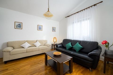 This comfortable and well-equipped 150 m² apartment is ideal for families or groups, offering two bedrooms and sleeping accommodations for up to four guests. The property features a lovely garden and a balcony, perfect for enjoying the outdoor atmosp...