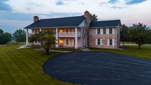 Broken Lance Ranch, located just outside Bucyrus, KS and minutes from Kansas City, is a legacy property featuring a large colonial-style home. The ranch encompasses 190 +/- acres of well-maintained pastures, several sizable ponds, a large barn for ag...