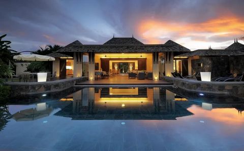 Gadait International offers you an exceptional 600 m² villa, nestled on a 5,600 m² plot in the heart of the prestigious Tamarina Golf Estate. This property elegantly combines tranquility, luxury and modern features for a unique living experience. Ima...