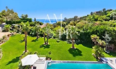 Amanda Properties offers in Cannes, in a quiet residential area, this magnificent architect-designed villa comfortably equipped with luxury amenities and heated pool, offering a beautiful view of the sea and the Lérins islands. Nestled on the prestig...