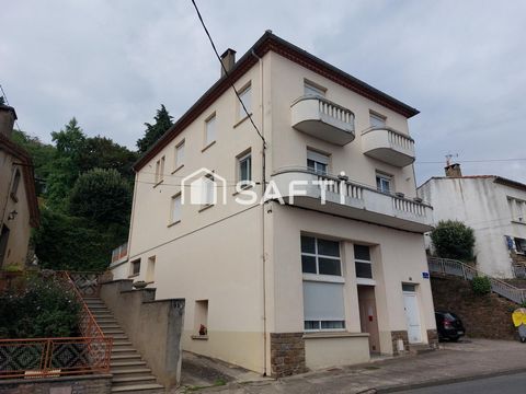 Immmeuble comprenant 4 appartements et un garage.