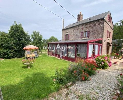 Belle maison en brique dans le pays d'auge orné