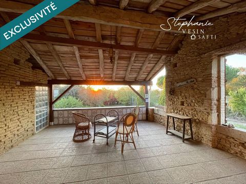 Maison de village avec petit jardin, terrasses et garages
