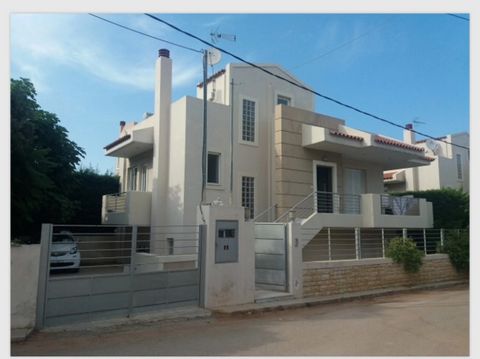 Modern house for sale in Nea Makri. House with an area of 160 sq.m. located on a plot of 250 sq.m. The house is within walking distance from the sea. The house consists of a living room with a kitchen, three bedrooms, two bathrooms and a storage room...