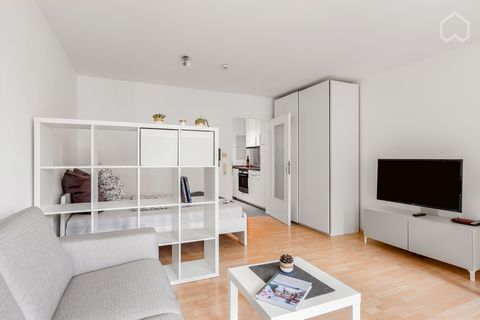 Come in and feel at home. The modern furnished, bright 1-room apartment has a spacious living/bedroom (french bed with high quality mattress, closet, room divider, table, 2 chairs, TV shelf, flat TV, sofa, coffee table) with access to terrace and sma...