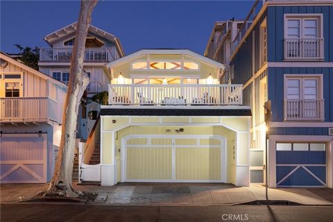 Situated in the picturesque heart of The Village in Laguna Beach is a lucrative, turnkey investment opportunity: a triplex bathed in coastal charm and superbly located. The property is spread across four stories, including the garage and boasts excel...