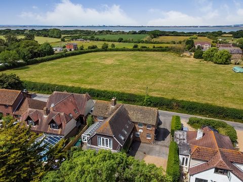 INTRODUCTION This unique home stands in a semi-rural part of north Hayling Island. The surrounding countryside is sparsely developed with sways of arable land and wildlife havens spreading towards both the eastern and western coastlines. Tucked behin...