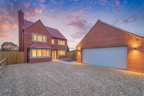 An impressive four-bedroom family home with quality interiors, an open-plan layout, and scenic views, where the contemporary exterior effortlessly merges indoor and outdoor living. Externally, it boasts an oversized double garage, ample parking for s...