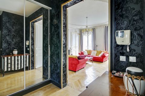 Welcome to our expansive 3-bedroom apartment, a haven that exudes the allure of Haussmannian architecture with its vintage parquet floors, intricate wall and ceiling moldings, and an ornate fireplace. Within walking distance of 