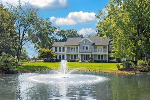 Fall in love with the serenity of this picturesque home with water views in the heart of Tokeneke that take your breath away. Designed with enjoyment in mind, the balconies from the second floor capture Long Island Sound, Scotts Cove and majestic vie...