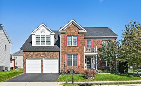 This stunning home in Stratshire Crossing combines luxury with a warm, welcoming feel, offering over 5,400 square feet of beautifully crafted space. From the moment you enter, you're greeted by sunlight pouring into the open layout, highlighting the ...