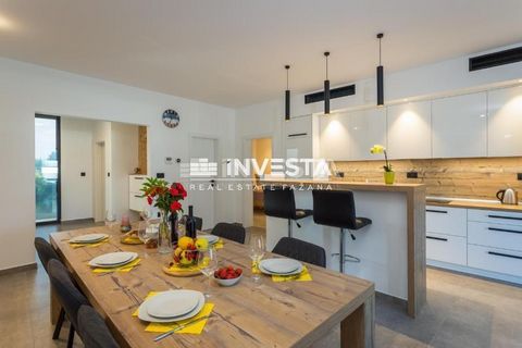 Location: Istarska županija, Fažana, Fažana. This beautifully decorated apartment is located in a prime location in Fažana, only 80m from the sea and the beach. It is located on the first floor of a smaller building built in 2021. It has a total area...