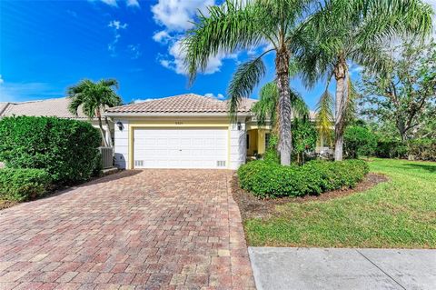 One or more photo(s) has been virtually staged. Feel like you are on vacation every day when you live in amenity rich Villagewalk. This sunlit home is the Carlyle plan which is rarely available and features 4 true bedrooms. With an open floor plan th...