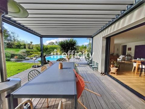 CONTEMPORARY HOUSE WITH SWIMMING POOL - SAINT EVARZEC - 29170 - 8 ROOMS - 5 BEDROOMS - 182m² (166m² of living space) Efficy, the real estate agency that estimates your property online, offers you this contemporary house, built on a beautiful wooded p...