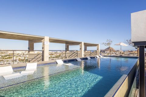 Experience urban living at its finest in this fully furnished 2 bedroom 2 bathroom condo in Cardinal Living located in the heart of Cabo San Lucas. This stylish condo comes turn key equipped with hurricane shutters for added peace of mind. Enjoy city...