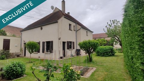 Maison de caractère avec grange et jardin paysager
