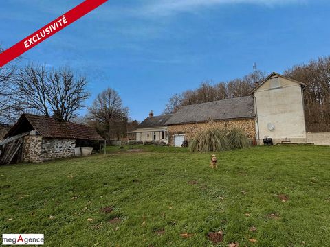Propriété composée de deux logements indépendants séparés par une grange