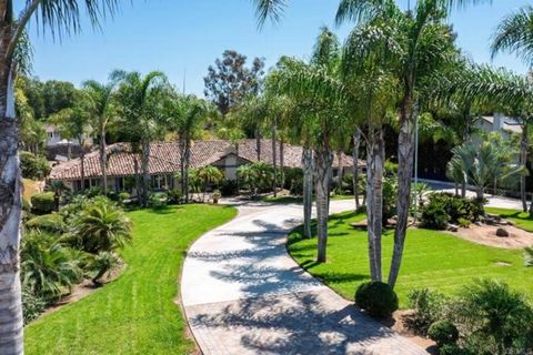 Welcome to this stunning single-story estate on one of Vista's most sought-after streets set on nearly an acre (.95) with a circular driveway, and a private automatic gate leading to the saltwater pool and huge backyard. This 4-bedroom, 3.5-bathroom ...