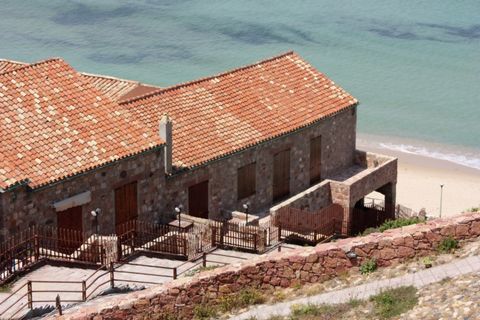 2-bedroom terraced house in the complex “Antica Tonnara di Porto Paglia” in Gonnesa, on the west coast of Sardinia. It dates back to 1420 and was completely renovated. Casa di Linda is an apartment on 2 levels, on the front line of the building, in a...
