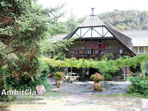 Montseny Natural Park Mountain hotel with excellent location, in privileged surroundings, easy access and parking. The building is 1,310m² on a plot of approximately 12,500 m². With a total of 15 suite rooms, hall, reception, 2 large living rooms, ki...