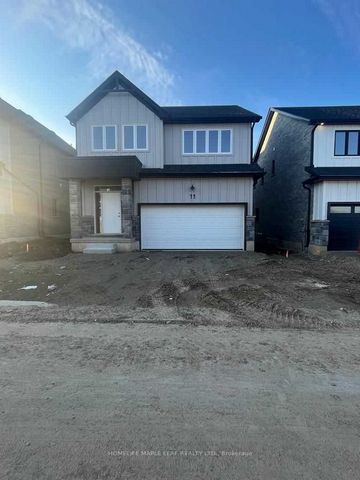 Welcome to 11-32 Faith St., Cambridge! This newly built 4-bed + Office , 3.5-bath, 2-story home is perfectly situated in a prime location on a Lot Backing On The Pond! Boasting a 2 car garage and 2 driveway parking spots, convenience is at your doors...