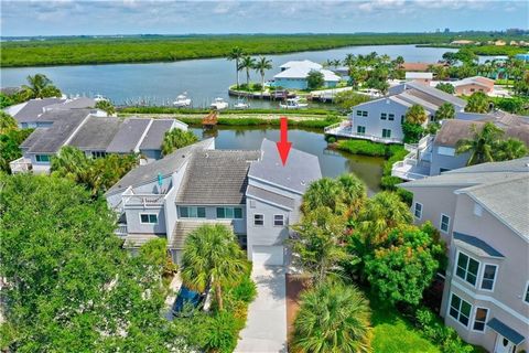Nestled along the scenic banks of the Indian River, this waterfront dwelling serves as an idyllic sanctuary for those with a passion for boating. Complete with a commodious 39' boat slip featuring a boat lift, you can revel in endless days of aquatic...