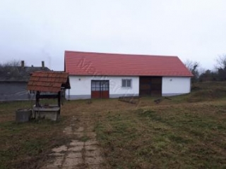 Price: £92,365.00 Category: House Area: 140 sq.m. Plot Size: 13792 sq.m. Bedrooms: 3 Bathrooms: 2 Location: Countryside £92, 365 All-in costs, excluding 4% tax On the edge of a beautiful village in Zala, near a forest, you will find two houses, a lar...