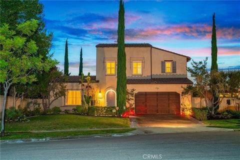 Welcome to your new home in the famous Three Oaks Community, nestled on a hill in the exclusive Walnut neighborhood! This expansive, elegant two-story residence offers breathtaking day and night views of the San Gabriel Valley and San Gabriel Mountai...