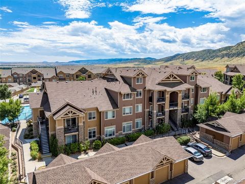 You won’t have to drive far to the mountains with this home! Located right at the foothills, this two level condo is in Chatfield Bluffs! Walk into a naturally bright and open floor plan with high vaulted ceilings! Perfect for entertaining with the k...