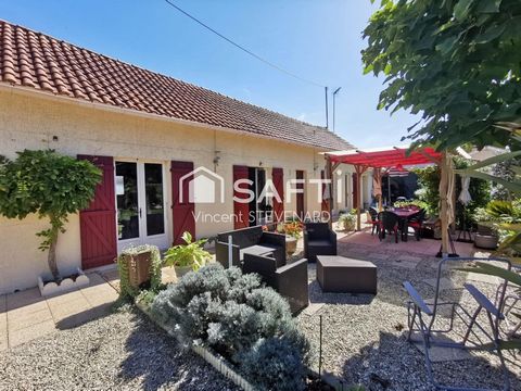 Maison T6 de 132m² avec jardin et garage.