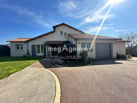 Maison de 7 pièces de 215 m² avec dépendances