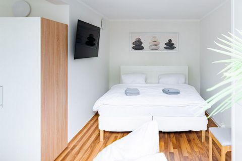 Welcome to our modern apartment at Rostock Central Station! This accommodation offers space for 4 people and has newly furnished rooms with a comfortable king size bed, a small kitchen, a modern bathroom and Wi-Fi and TV. Furthermore, there is a pull...