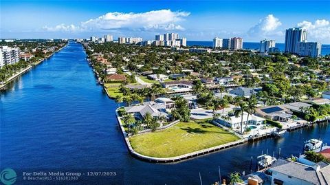 Rare Intracoastal Point Lot sited on 221’+/- of wraparound waterfrontage in the prestigious gated enclave of Bel-Air Isles. With a full set of building plans included to build a 6,492 SqFt+/- luxury home, this .33 acre+/- lot is positioned ideally fo...