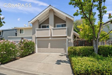 Beautiful 3-bedroom, 2.5-bathroom townhome in the community known as Los Gatos Woods. This spacious home has an updated kitchen with granite counters, new GE range and refrigerator, and a newer GE microwave. Large window over the kitchen sink overloo...