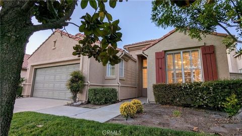 This is your extraordinary opportunity to purchase a highly desirable Cozumel floor plan on a very private lot at The Oasis in Menifee, a premier 