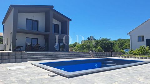 Location: Primorsko-goranska županija, Vrbnik, Vrbnik. Island of Krk, Vrbnik - a house with a beautiful view of the sea and a swimming pool. For sale is a new house with an area of ​​138 m2, built on a plot of 851 m2. The house consists of two floors...