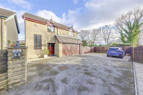 This spacious, 4 bedroom detached family home has been extended and offers gardens, a conservatory, double integral garage, off road driveway parking and a spacious 1/4 acre plot - the largest on its small development. With a highly sought after posi...