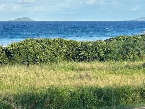 Stunning vistas await you from this gentle sloping lot right across the street from the icy blue Caribbean Sea. Located in the gated community of Judith Fancy where you can find people of all ages out walking, running biking and the surfers riding th...