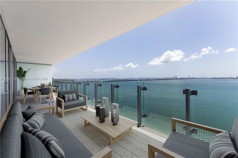 Indulge in luxury at this waterfront residence in Missoni Baia, the only unit with two dedicated parking spaces. This spacious 2-bedroom apartment features two waterfront suites, a stunning main bathroom, and a versatile den that can serve as a libra...