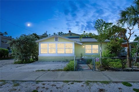Welcome to this impeccably maintained, move-in ready mid-century gem! This unique property, officially a triplex, offers a main house, a two-bedroom apartment over the garage, and a newly built ground-floor bonus one bed/bath guest suite. The main ho...